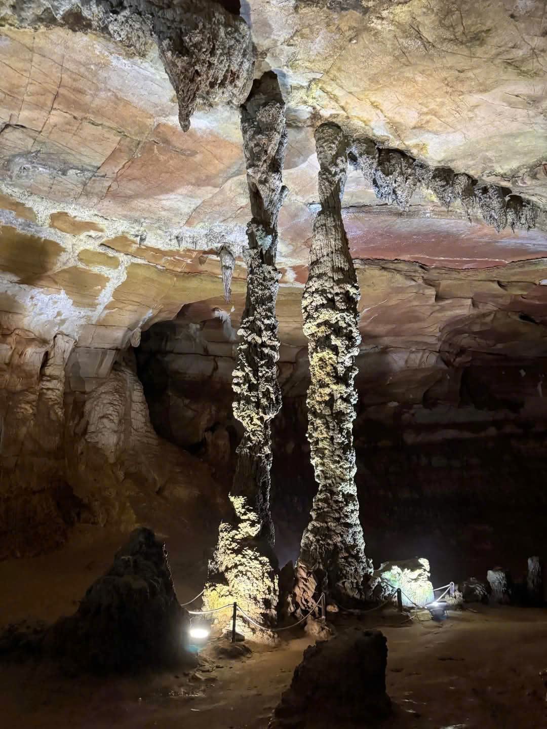 Towering stalactite column formation inside Phong Nha Cave